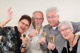 Two+senior+couples+toasting+on+a+Happy+New+Year.