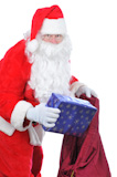 Santa+Claus+Putting+Present+in+Bag
