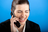 happy+businesswoman+calling+at+phone