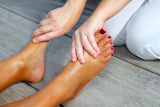 Reflexology+woman+feet+massage+therapy+outdoor