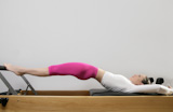 gym+woman+pilates+stretching+sport+in+reformer+bed+instructor+girl