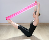 pilates+yoga+resistance+band+red+rubber+woman+sport+gym+fitness+exercise