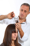 Hairdresser+cutting+woman%27s+hair
