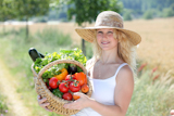 Beautiful+woman+holding+basket+of+fresh+vegetables