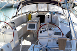 double+wheel+sailboat+stern+deck+area+moored+in+marina