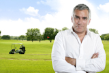 Golf+senior+golfer+man+portrait+in+green+course+outdoor+cart+background