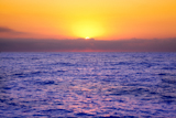 Mediterranean+sea+sunrise+with+orange+sky+and+purple+ocean