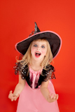 Halloween+kid+girl+costume+on+orange+background