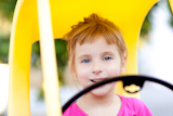 blond+children+girl+driving+toy+car+yellow
