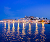 Ibiza+island+night+view+of+Eivissa+town+and+sea+lights+reflection
