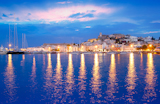 Ibiza+island+night+view+of+Eivissa+town+and+sea+lights+reflection