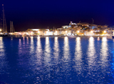 Ibiza+island+Eivissa+town+night+view+of+downtown+and+sea+reflection