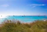 Illetes+Formentera+beach+turquoise+water+with+Ibiza+mountains+away