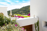 Ibiza+white+houses+and+flowers+in+Sant+Miquel+de+Balansat