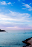 Ibiza+cala+Conta+Conmte+sunset+with+catamaran+sailboat