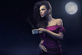 Cute+woman+drinking+coffee+on+the+midnight
