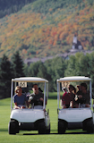 Two+couples+riding+golf+carts