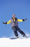 Man+snow+boarding+on+a+mountain
