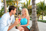 Just married couple having a cocktail in luxury resort