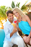 Just married couple having a cocktail in luxury resort