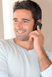 Portrait of man talking on mobile phone