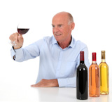 Portrait of winemaker tasting wine