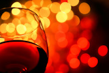 close-up,of,wineglass,with,copyspace,and,abstract,lights,background
