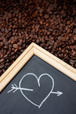 Coffee beans and heart shape ,selective focus on nearest part
