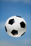 soccer,ball,on,the,blue,sky,background,,selective,focus,on,nearest,part,of,ball