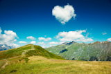 Caucasus mountains. Abkhazia. Heart from cloud in the blue sky