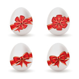 Set of four Easter eggs with red bow