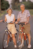 Older+Couple+Riding+Bikes+Together