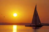 Sailboat+Sailing+at+Sunset