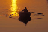 Rowing+a+Boat+at+Sunset