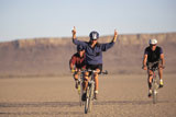 People+Riding+Bikes+in+the+Desert