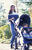 Woman+Pushing+a+Baby+in+a+Stroller