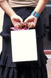 Woman+Holding+Shopping+Bag