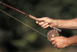 Hands+Holding+a+Fishing+Rod