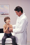 Doctor+Letting+Little+Boy+Use+Stethoscope