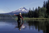 Man+Fly+Fishing+In+Mountain+River