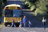 Children+Crossing+Street+In+Front+Of+School+Bus