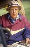 Elderly+Male+Golfer+Driving+Golf+Cart