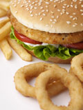 Close-up+of+a+burger+with+French+fries+and+onion+rings