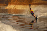 A+young+man+water+skiing+in+a+river