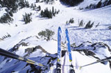 High+angle+view+of+a+pair+of+skis+on+the+edge+of+a+cliff