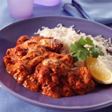 Close-up+of+chicken+tikka+masala+with+rice+on+a+plate