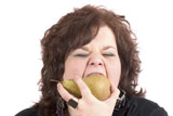 Big+woman+taking+a+big+bite+out+of+a+pear
