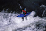 Man+Kayaking+through+White+Water