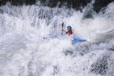 Man+Kayaking+Throught+White+Water