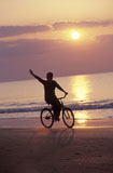 Riding+A+Bike+on+the+Beach